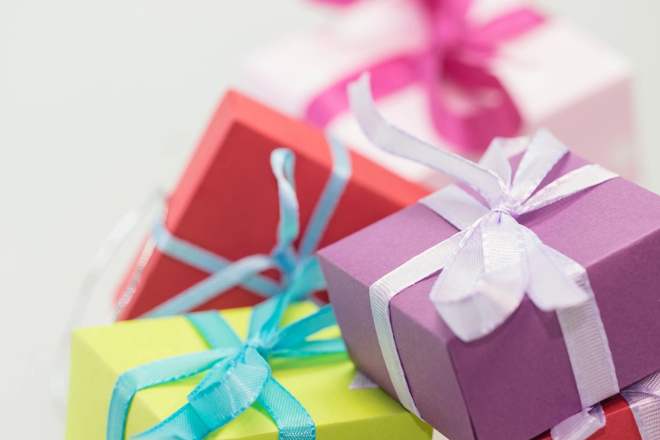 Colorful gift boxes with ribbons